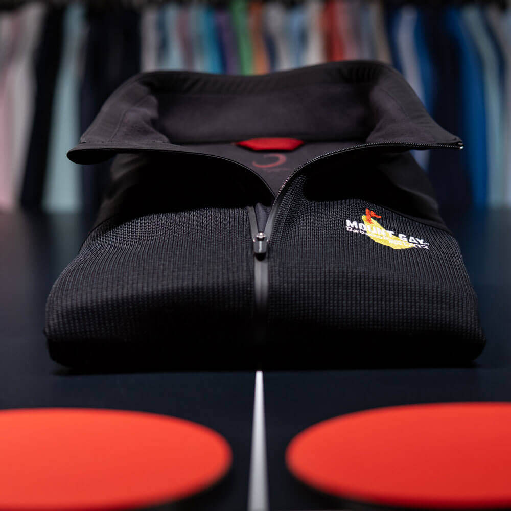 Zero Restriction Golf. Embroidered Jackets. Custom Golf Hats. Custom Vest. Custom Quarter Zips.