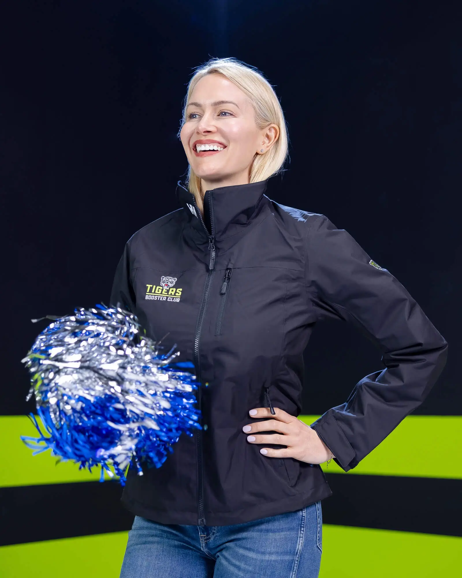 School booster supporters wearing custom women's apparel with school colors