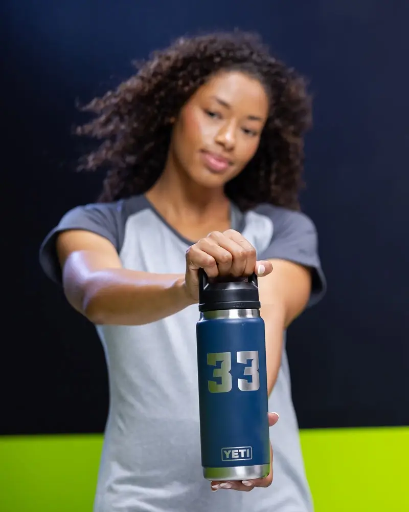 Custom YETI tumblers with engraved team logos
